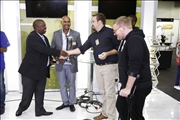 Mr Motsamai hands over the trophy to the winners of DWS/OGP Hackathon 2016